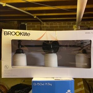 Brand New. 3 light vanity.